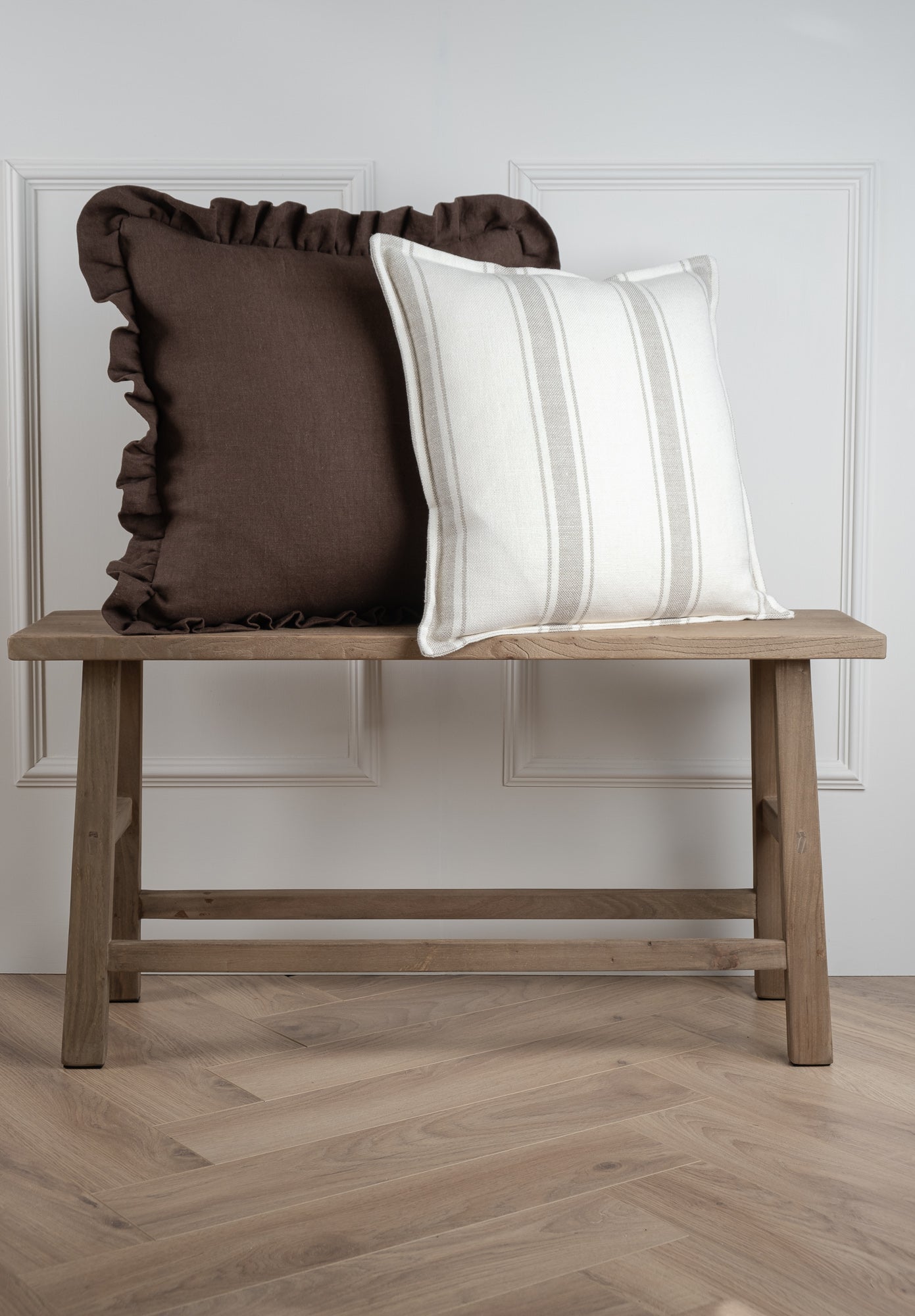 Brown and neutral Irish linen cushions stacked. Handmade in Ireland