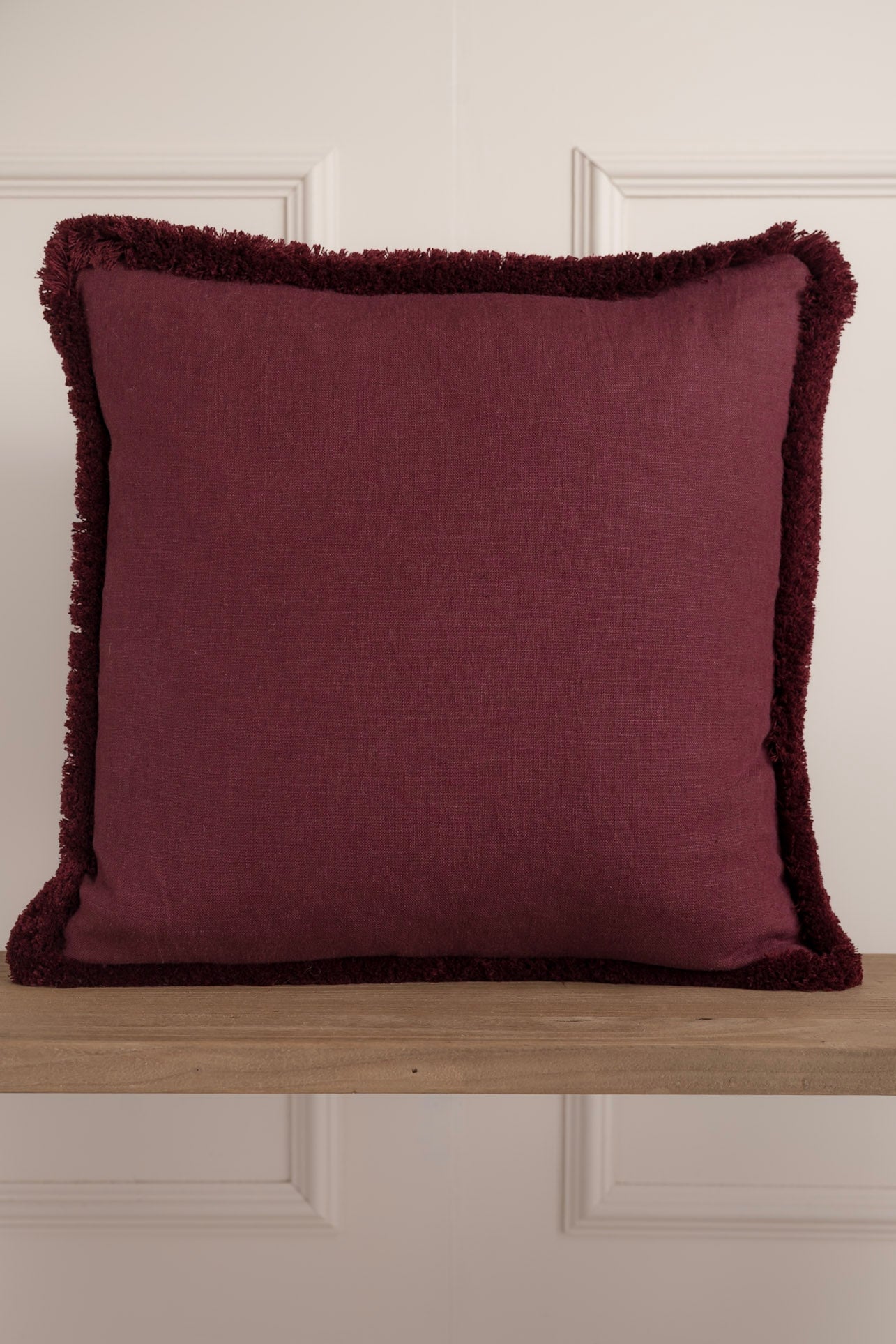 Burgundy Irish Linen Cushion with Burgundy Fringe detail. 100% Irish Linen, Woven Designed and Made In Ireland