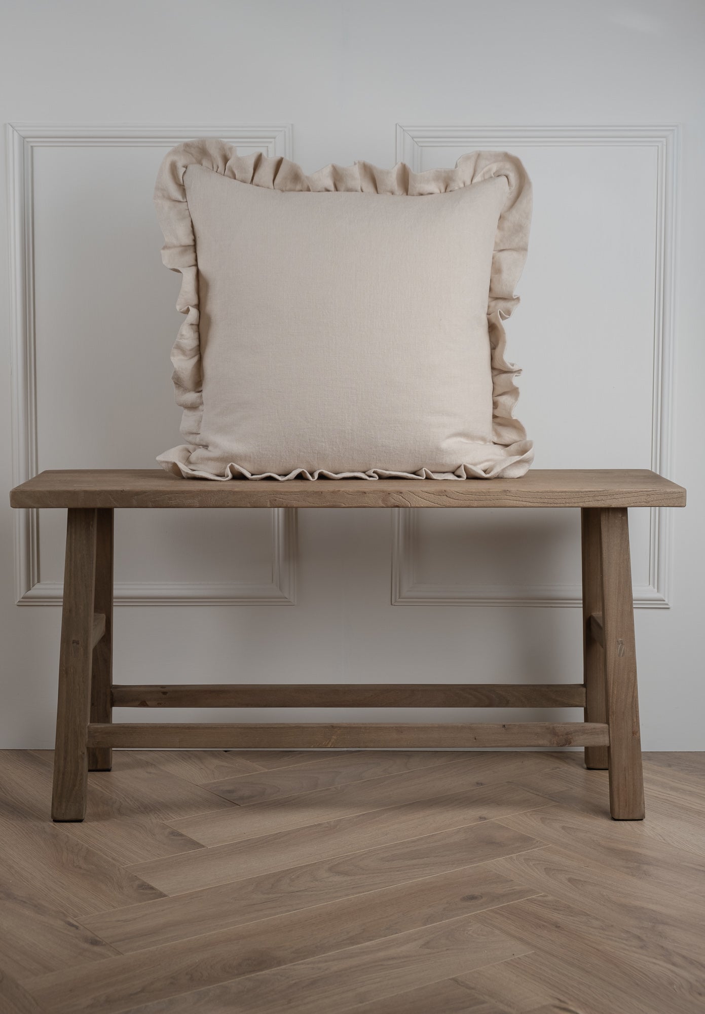 A light soft pink beige linen frilled cushion. 100% Irish Linen, Made in Ireland. This linen has a beautiful laundered finish witch leaves a beautiful textured natural finish to the cushion. Relaxed feel 
