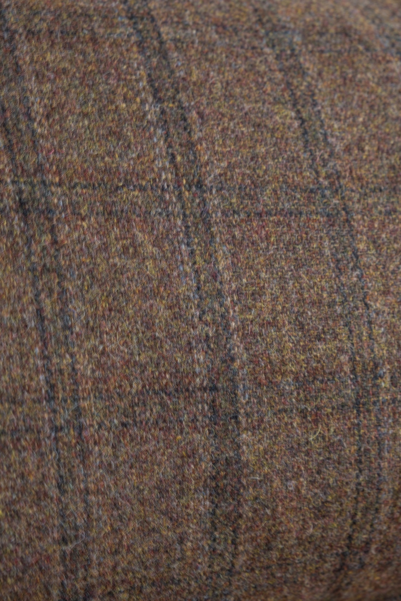 close up of the fabric Brown Checked tweed cushion. Irish Tweed