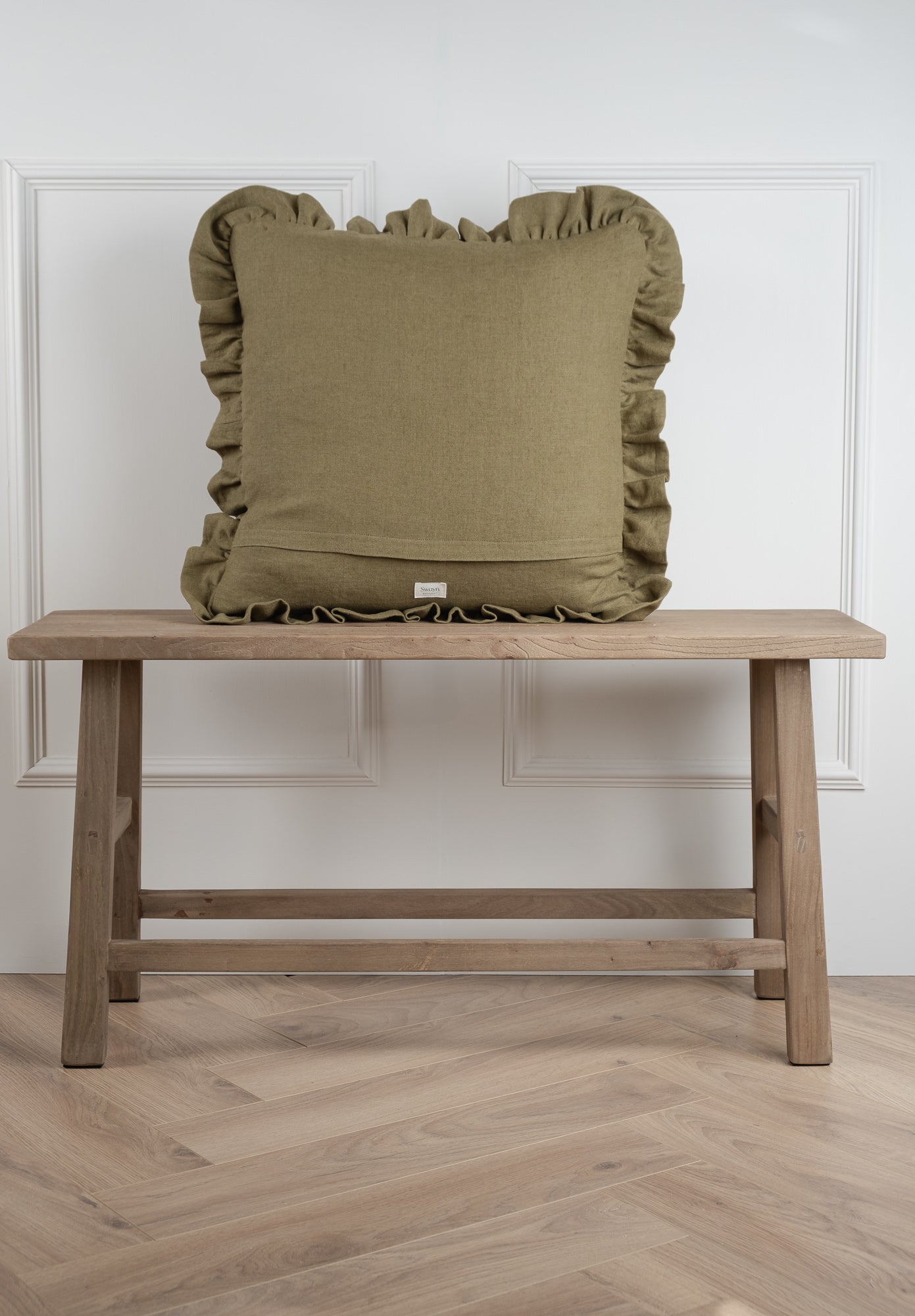 Olive green frilled linen cushion