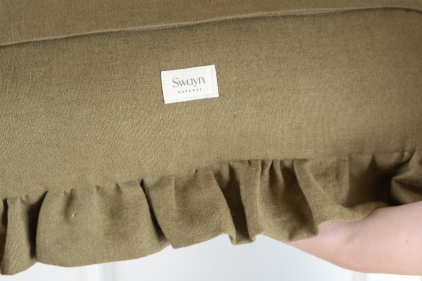 Olive green frilled cushion