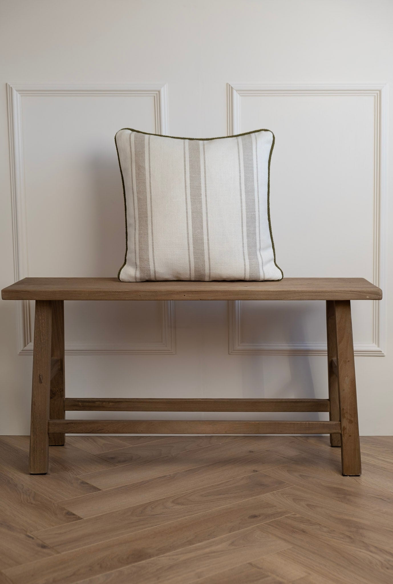 Striped 100% Linen Cushion featuring an olive green corded trimmed. Made in Ireland